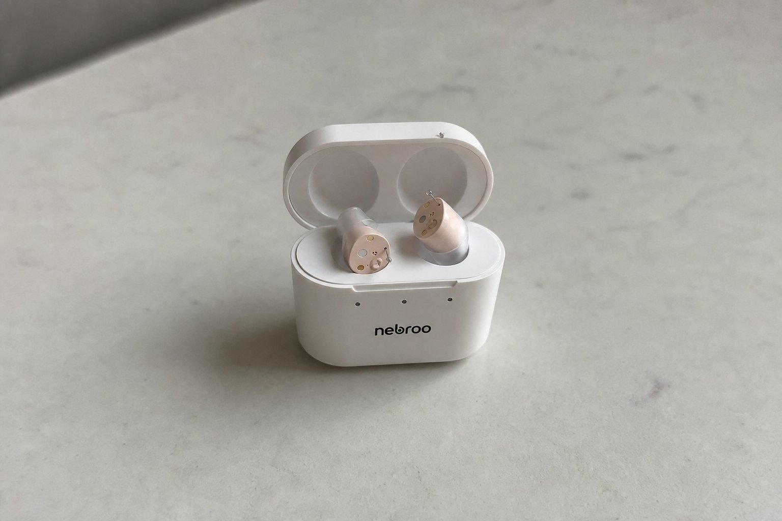 HearWell by Nebroo hearing aids with charging case