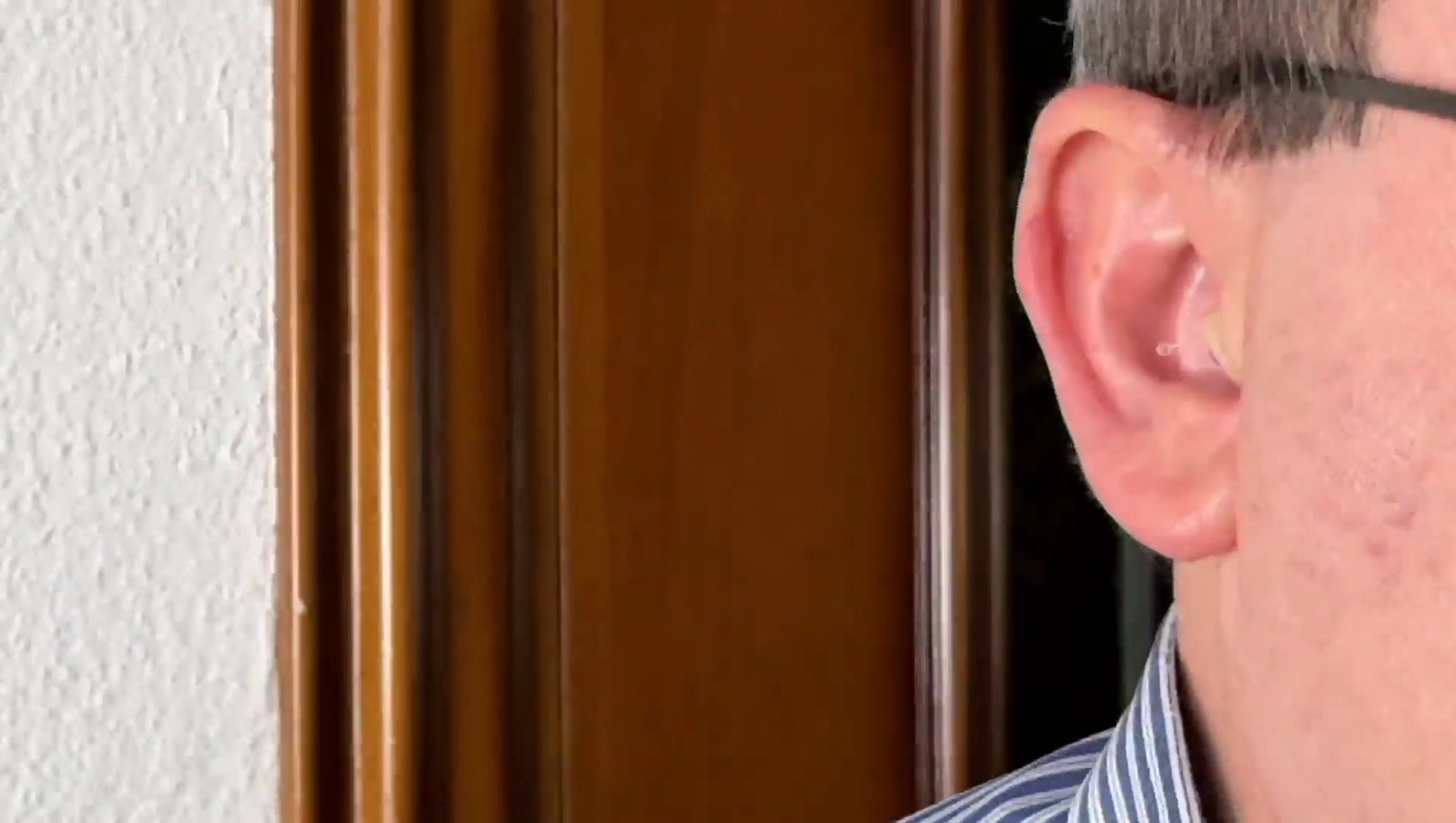 Man wearing a discreet in-canal hearing aid